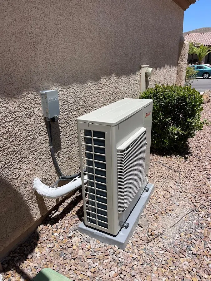 Residential air conditioning condenser unit in Peninsula